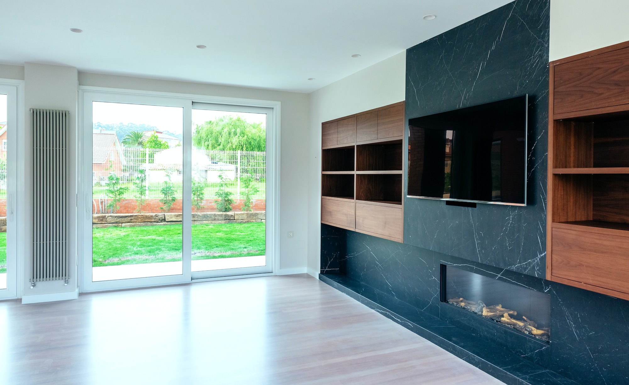 Living room with fireplace and TV